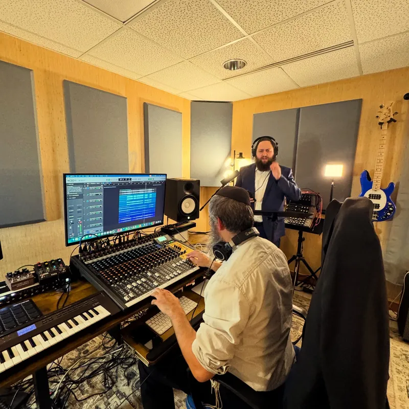 Motty at the mixing desk in his studio